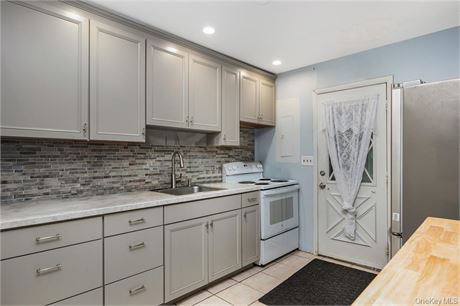 large Colonial full front & rear dormer, 699 k on quiet mid-block in the hear